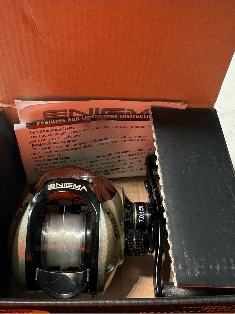 Bass Pro Shops Enigma Smart Cast Reel - Black and Gold - Picture 10 of 10